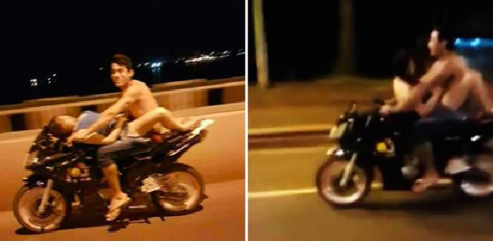 Horny couple found having sex on a speeding bike.